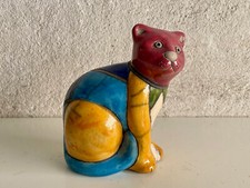 Statuetta gatto seduto in