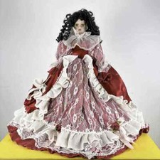 bambola vintage con parti in