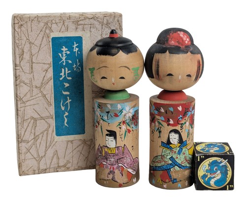 Coppia bambole kokeshi - di,