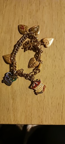 Vintage wotm gold tone charm - wotm,