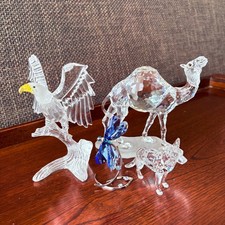 Lotto di 4 statuine animali