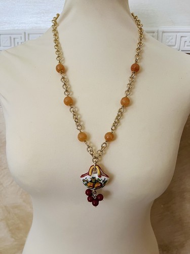 Collana con coffa decorata - con, in