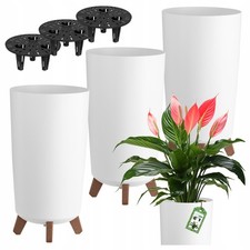 3 vasi da fiori bianchi su