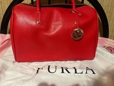 Borsa bauletto furla mai usata con cerniere con ancora la pellicola e sacchetto 