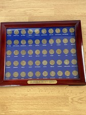 Cornice espositore monete con