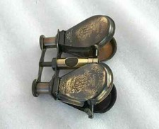 Antico binocolo monocolo