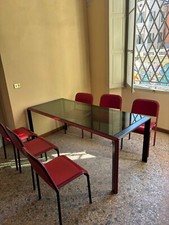 Tavolo con 6 sedie marca Poltrona Frau modello "Nota"