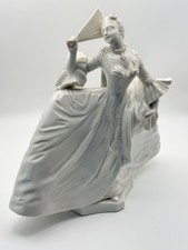 Antica statuina in porcellana