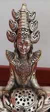 statua orientale argento