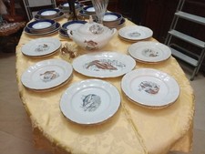 Servizio 12 piatti da pesce in fine porcellana con zuppiera e piatto di portata