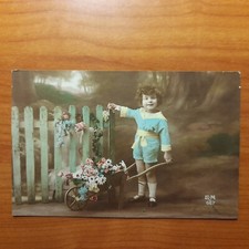 Cartolina bambino con cariola di fiori - E.M.667 viaggiata annullo Nice 1921