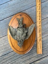 Antica scultura targa gioco