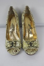 Scarpe scimmia cattiva tacco