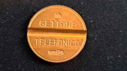 Gettone telefonico cmm 7712 - telefonico,