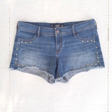Pantaloncini denim midi con borchie Hollister - taglia 11 - orlo grezzo - lavaggio medio - cuciture interne 4"