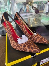 Scarpe con tacco alto