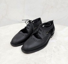 Dior Teddy Derby en Cuir