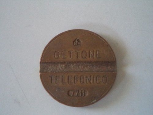 Gettone telefonico 7711 - gettone,