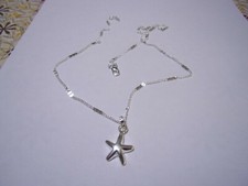 CATENINA  IN ARGENTO CON------stella di davide