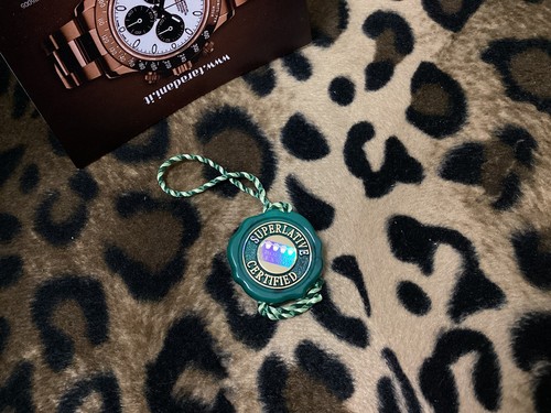 Rolex green hologram big - c),