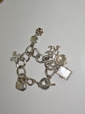 Bracelet large en acier signé