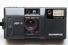 Olympus AF-1 con Olympus Zuiko