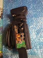 Canon XF105 Caméscopes'allume, mais manque couvercle du dessous et la partie d'e