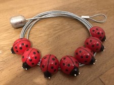 portafoto a filo metallico con