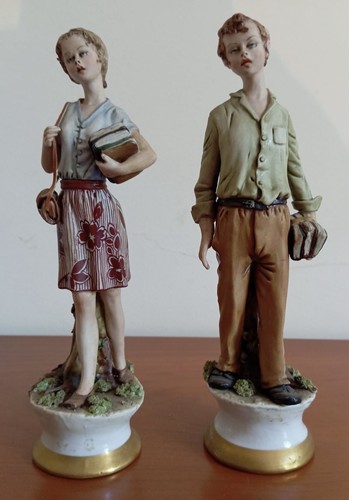 Coppia statuine in - di,