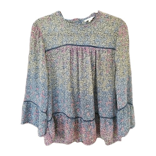 Blusa floreale trasparente