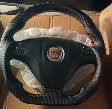 Volante pelle traforata e