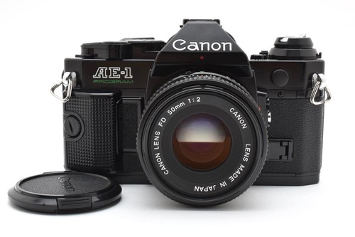 Quasi come nuovo canon ae - [quasi, nuovo]