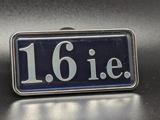 LANCIA 1.6 IE I.E. LOGO ORIGINALE SIGLA EMBLEMA FREGIO STEMMA SCRITTA BADGE NOME