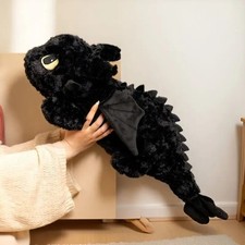 Peluche drago sdentato come