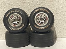 Un set/ruote usate (quattro pezzi) Ferrari f2004 Kyosho/senza inserti.