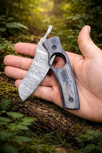 Coltello tagliasigari fatto - , a