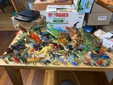 Enorme lotto di giocattoli dinosauri in gomma e plastica