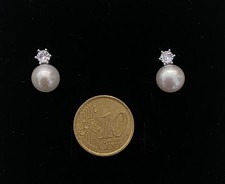 Orecchini punto luce in argento con vera perla d’acqua dolce