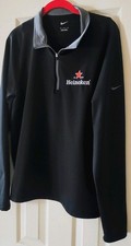 Maglione Nike manica lunga nero con logo Heineken sul davanti.  Taglia: M, colletto grigio
