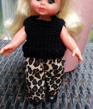 Pantaloni animalier e top nero