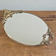 Antico specchio crest bordo ottone bronzo ornamenti con angelo vanità