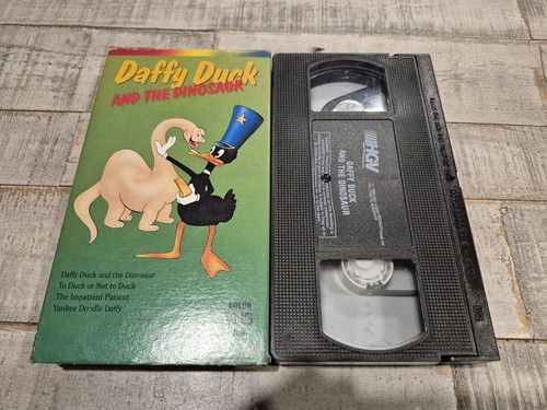 Daffy duck and - duck, dinosaur