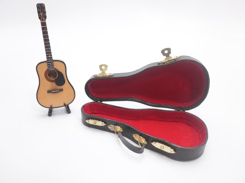 Mini chitarra acustica scala