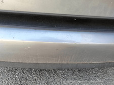 1334734 Paraurti post.  FORD