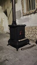 stufa a legna in ghisa usata