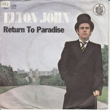 Elton john return to - –,