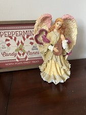 Figurina musicale angelo ospite melodico Natale in giro per il mondo 1999 - PEZZO RARO