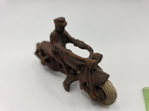 Antico giocattolo motociclista