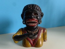 Salvadanaio antico in ghisa