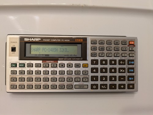Sharp 1403h pocket computer - sharp,